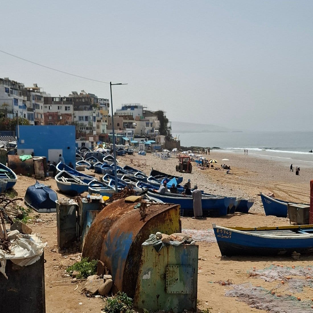 Blue fishing boats on Taghazout beach, Morocco