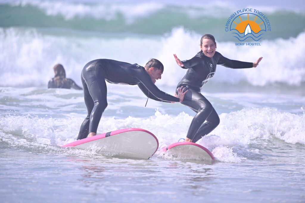happy guest surf lesson Surf Camp Taghazout — Surf & Stay Packages | Chiwash Surf